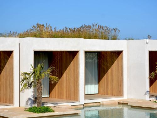 Suites with ornamental grasses on the roof